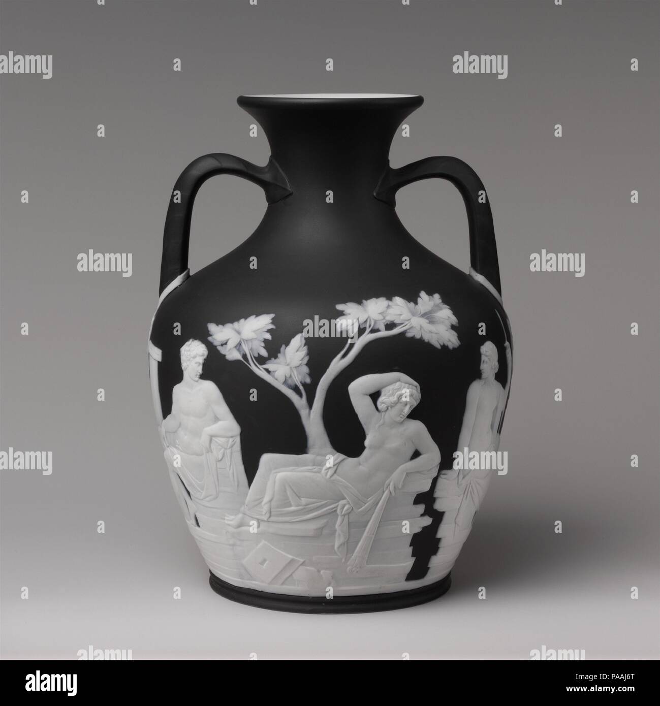 Portland vase. Culture: British, Staffordshire. Dimensions: Height: 10 3/8 in. (26.4 cm). Factory: Josiah Wedgwood and Sons (1759-present). Date: ca. 1840-60.  Josiah Wedgwood, whose ceramic creations evoked the styles and themes of antiquity so popular in the late eighteenth century, produced a copy of the celebrated Portland Vase in black-and-white jasper-ware. The original, attributed to the Roman gem-cutter Dioskourides, is in the style of works made between 30 and 20 B.C.  After its discovery in the late sixteenth century in the tomb of the Emperor Septimius Severus, it became one of the  Stock Photo