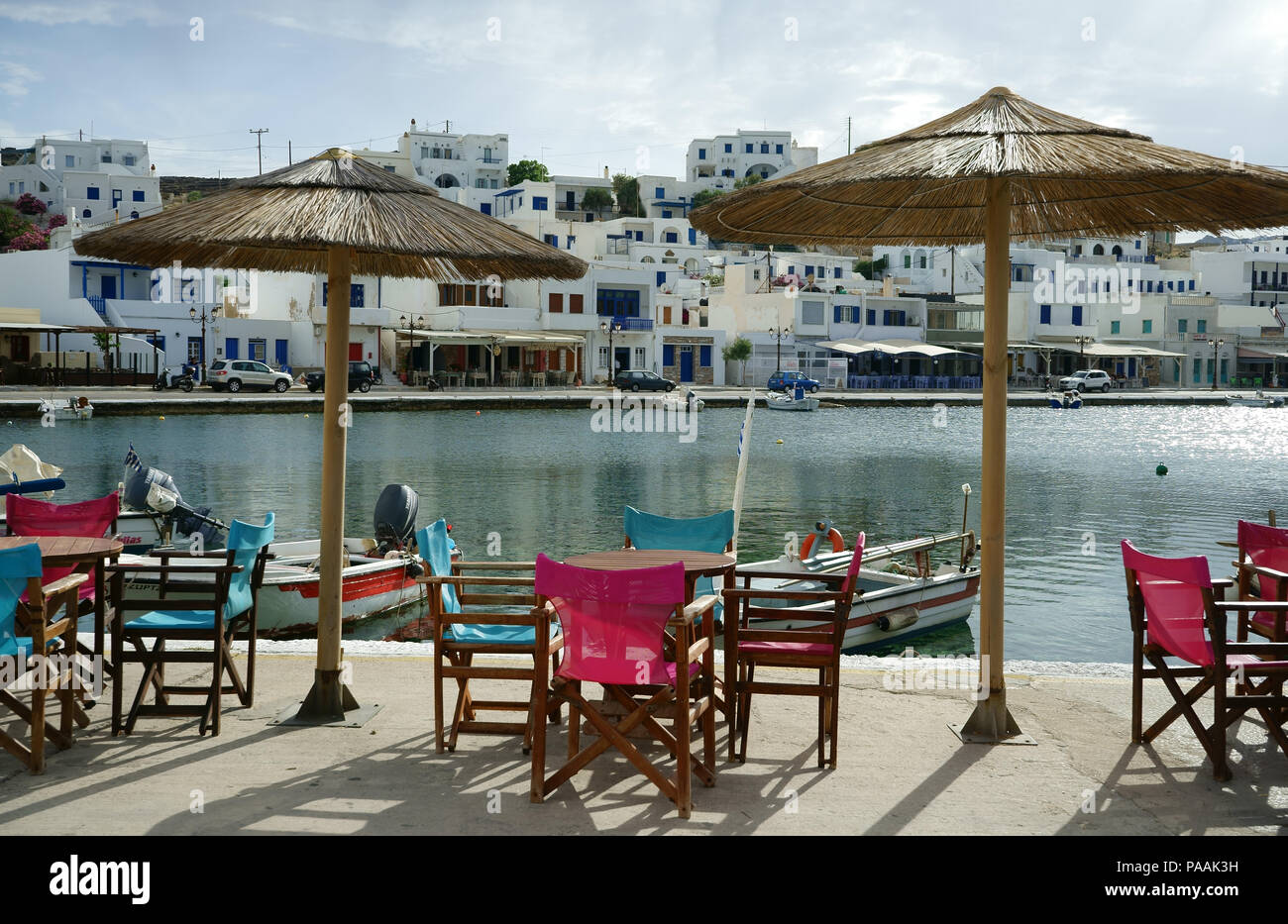 Street restaurant at Ormos Panormou or Panormos, island Tinmos, Cyclades, Greece Stock Photo