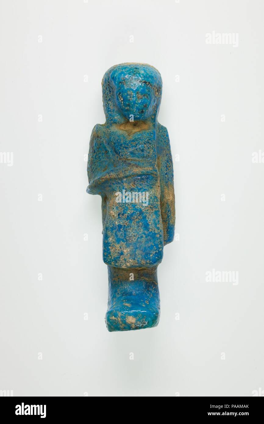 Overseer Shabti of Henettawy (C), Daughter of Isetemkheb. Dimensions: H. 12.1 × W. 4 × D. 3.3 cm (4 3/4 × 1 9/16 × 1 5/16 in.). Dynasty: Dynasty 21. Date: ca. 990-970 B.C.. Museum: Metropolitan Museum of Art, New York, USA. Stock Photo