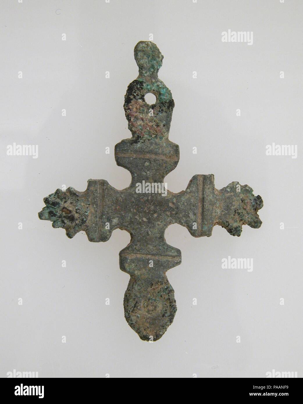 Cross. Culture: Frankish. Dimensions: Overall: 1 9/16 x 1 3/16 x 1/16 in. (4 x 3 x 0.1 cm). Date: 500-600. Museum: Metropolitan Museum of Art, New York, USA. Stock Photo