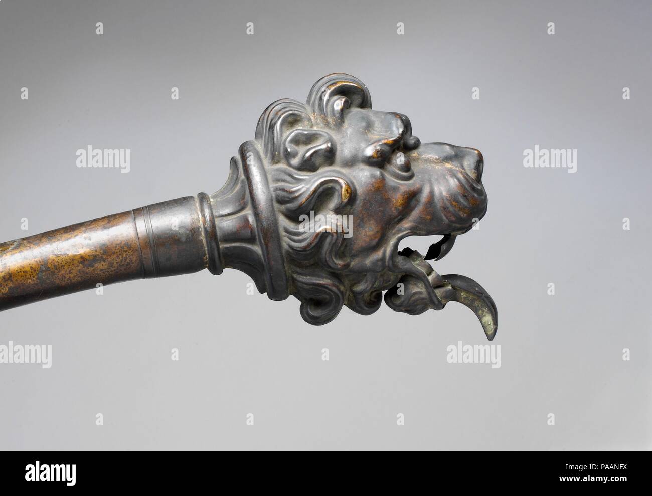 Serpon En Metallo. Culture: Italian. Dimensions: Height (From head to U-bend): 22 1/16 in. (56. cm)  Diameter (Of bell at gargoyle mouth opening): 11 13/16 in. (30 cm). Maker: Attributed to Leopoldo Franciolini (Italian, Florence 1844-1920 Florence). Date: 19th century. Museum: Metropolitan Museum of Art, New York, USA. Stock Photo