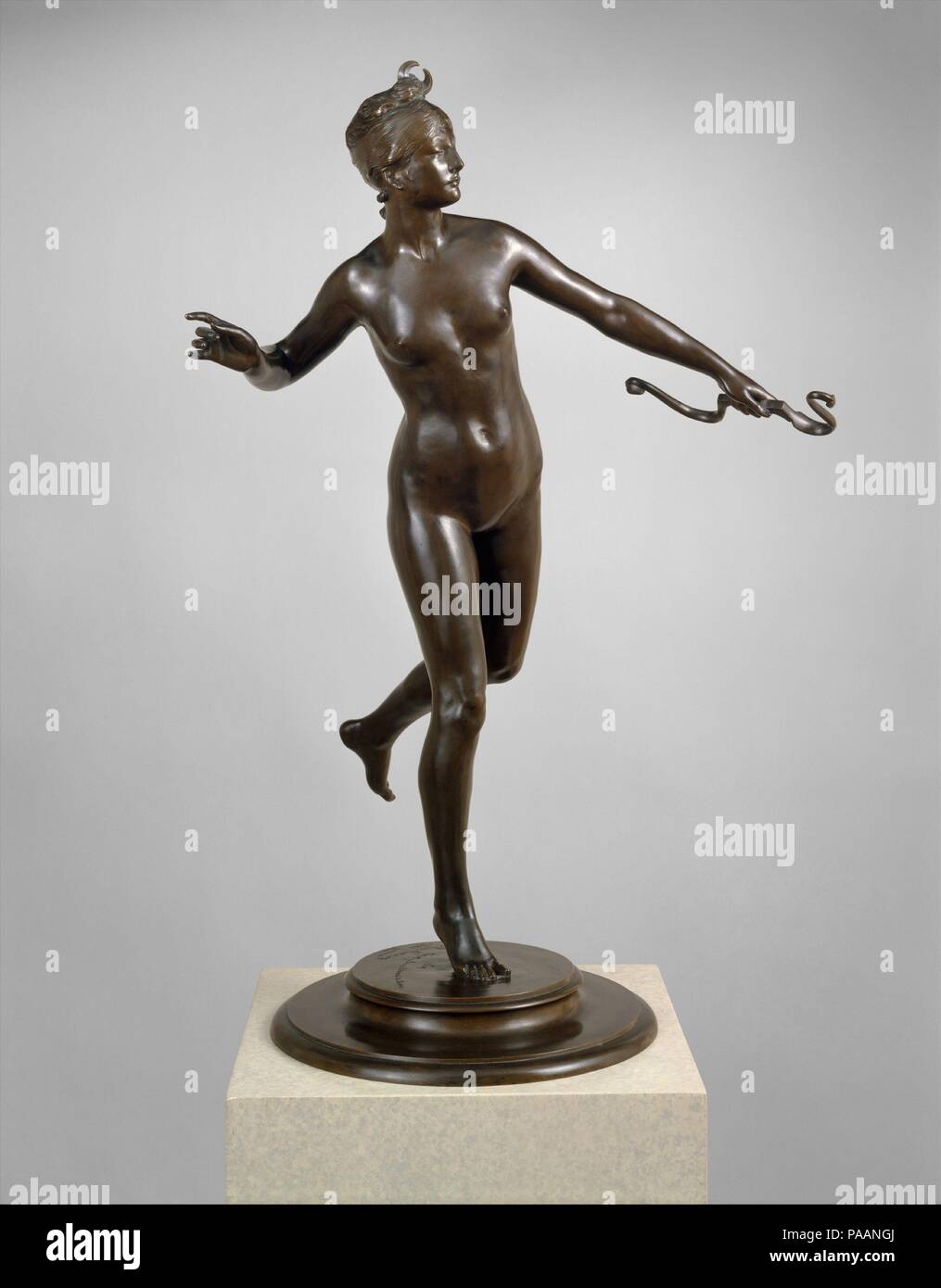 Diana. Artist: Frederick William MacMonnies (American, New York 1863-1937 New York). Dimensions: 30 3/4 x 12 1/4 x 12 1/4 in. (78.1 x 31.1 x 31.1 cm). Date: 1888-89; cast 1890.  While a student at the École des Beaux-Arts in Paris, MacMonnies began modeling his first statue, 'Diana'. After earning an honorable mention for a life-size plaster cast of it at the Salon of 1889, MacMonnies cast Diana as a bronze statuette the following year. Here, the Roman goddess is represented as a huntress wearing a crescent-moon hairpiece. She balances athletically on one foot, having just released an arrow fr Stock Photo