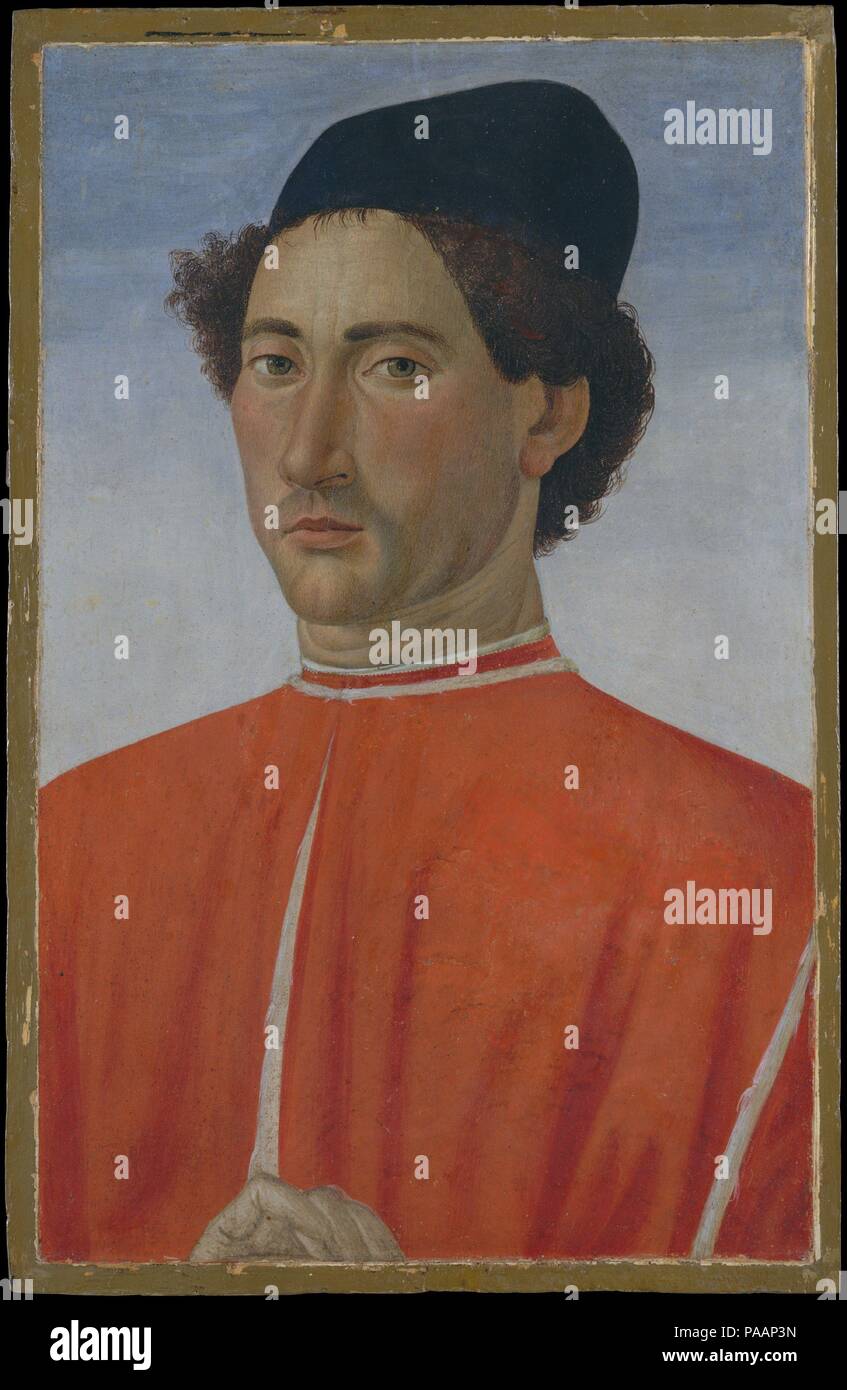 Portrait of a Man. Artist: Cosimo Rosselli (Italian, Florence 1440-1507 Florence). Dimensions: 20 3/8 x 13 in. (51.8 x 33 cm). Date: ca. 1481-82.  Whether this portrait was painted in Rome, where Cosimo Rosselli was employed in the Sistine Chapel, or in Florence, cannot be said with certainty. The sitter wears a costly red doublet lined in ermine and places his hand on the edge of the frame, in a manner found in the Netherlandish portraits of Hans Memling. Netherlandish portraits were much appreciated for their descriptive truthfulness. Museum: Metropolitan Museum of Art, New York, USA. Stock Photo
