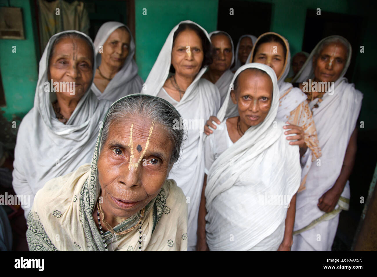 Indian Hindu widows living in communities in ashrams in Vrindavan , India Stock Photo
