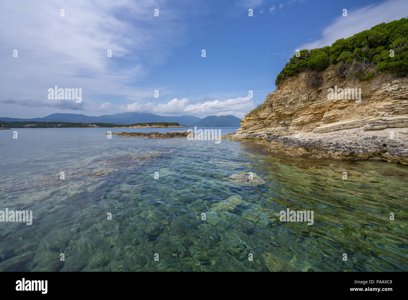 Desimi Beach Golf and nearby Island with clear water Stock Photo