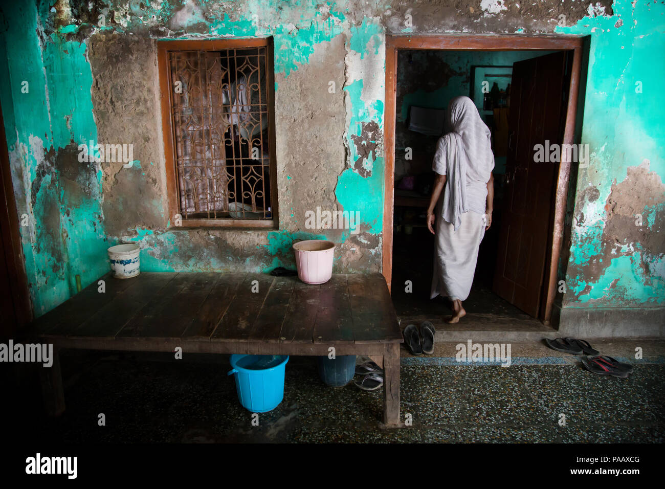 Lonely Indian Hindu widow woman living in an ashram for widows in Vrindavan , India Stock Photo