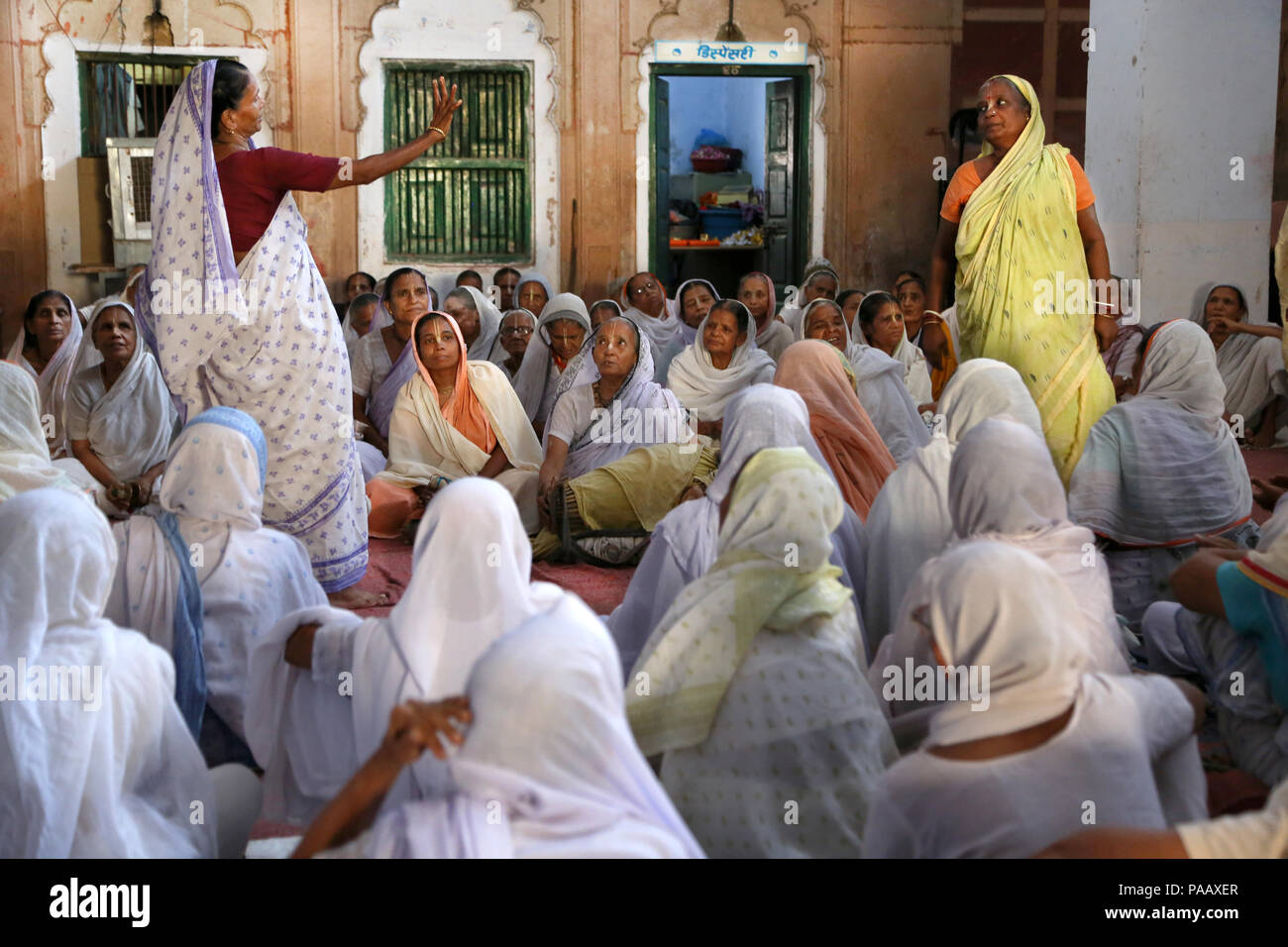 Indian Hindu widows living in communities in ashrams in Vrindavan , India Stock Photo