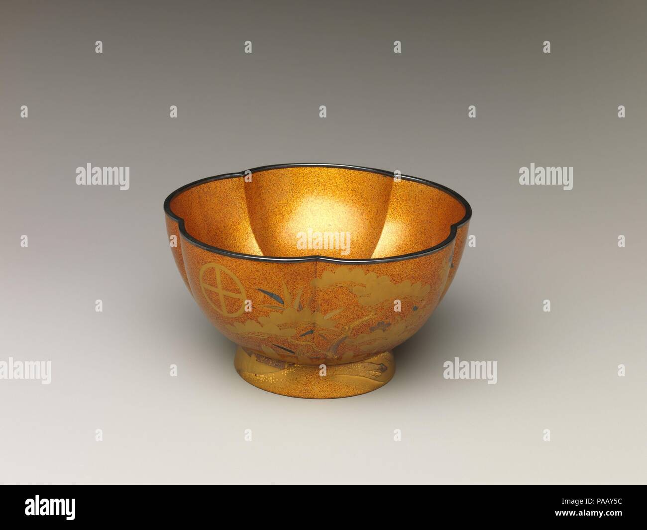 Bowl with with Design of Pine, Bamboo, and Cherry Blossom. Culture: Japan.  Dimensions: H. 3 3/8 in. (8.6 cm); W. 6 1/4 in. (15.9 cm). Date: 19th  century. This bowl, part of
