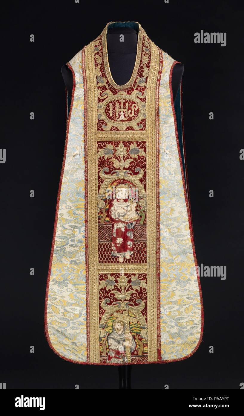 Chasuble. Culture: Italian. Dimensions: Length at CB: 50 in. (127 cm). Date: 16th century.  This early-18th century chasuble is adorned with 16th-century orphreys; a notable example of how these embroidered bands were treasured, preserved and reapplied to chasubles from one century to the next. The skilled workmanship depicts 4 church figures: St. Anthony of Padua, with a book as Doctor of the Church; possibly St. Leonard of Porto Maurizio, with a large cross alluding to the devotion of the Stations of the Cross, which he championed; St. Francis of Assisi, shown with stigmata, and St. Bonavent Stock Photo