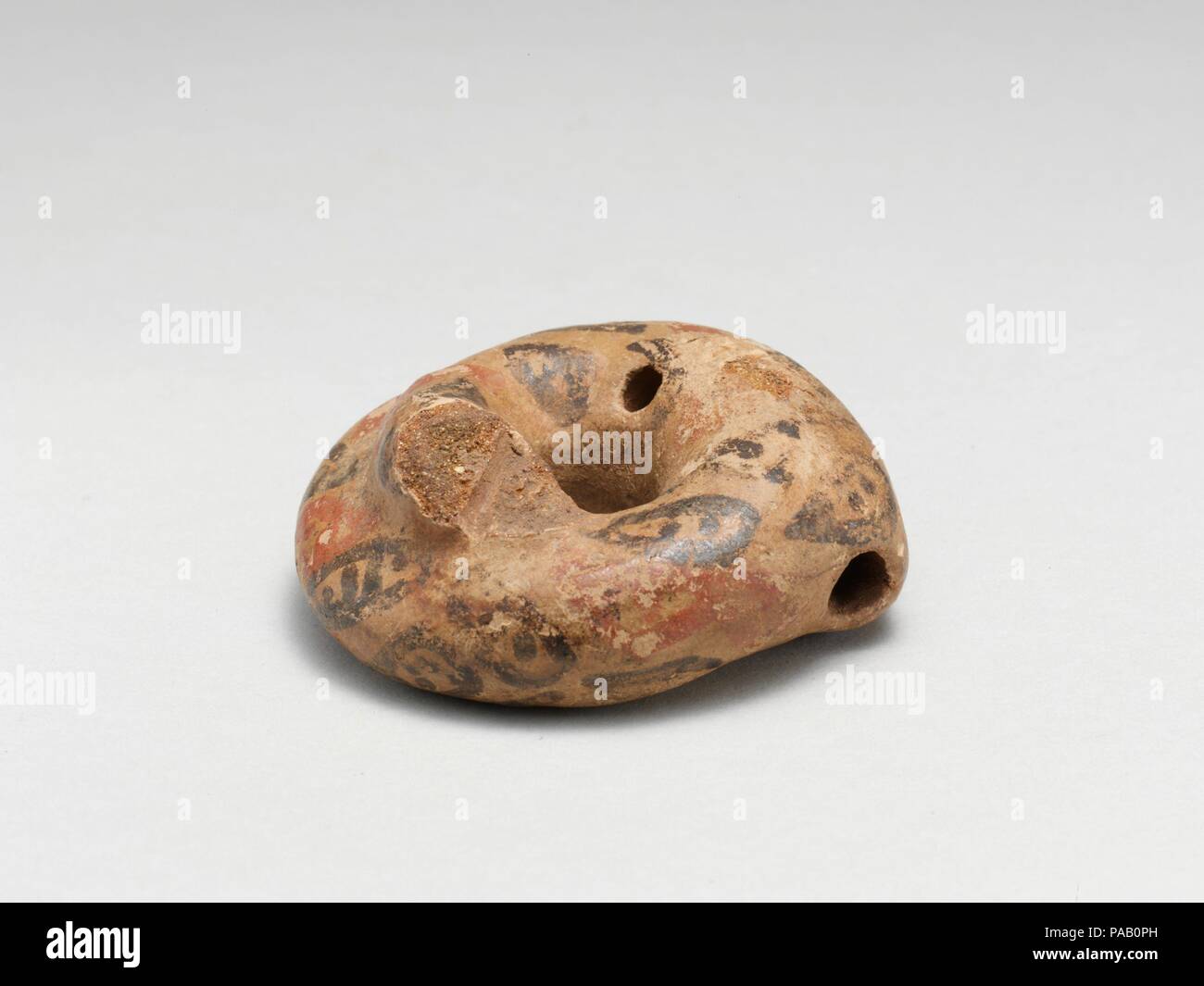 Pottery Whistle. Culture: Costa Rican. Dimensions: H: 25mm; D: 62mm.. Date: ca. 800-1525. Museum: Metropolitan Museum of Art, New York, USA. Stock Photo