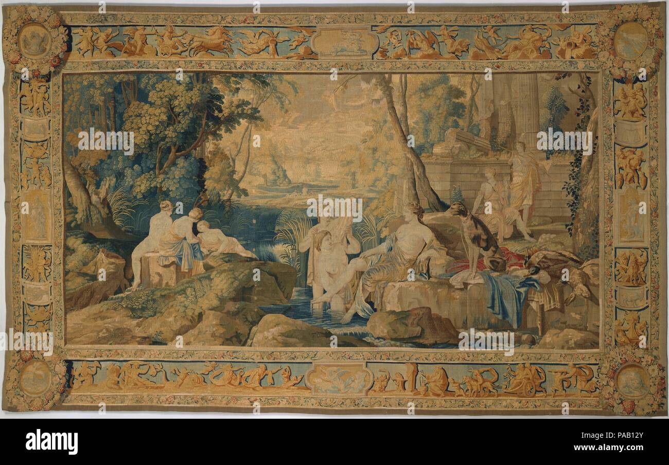 Diana and her Nymphs. Artist: After a painting by Laurent de La Hyre (French, Paris 1606-1656 Paris). Culture: French, Paris. Dimensions: 136 1/2 x 216 1/2 in. (346.7 x 549.9 cm). Maker: Weaving workshop directed by Hippolyte de Comans (Faubourg Saint-Marcel, Paris, active 1651-65). Date: before 1662.  This tapestry depicts the goddess Diana bathing with her nymphs after the hunt (in classical legend, Diana was the goddess of the hunt). The scene takes place before the ruins of a classical temple, beyond which an idealized landscape stretches into the distance. The elaborate borders feature a  Stock Photo