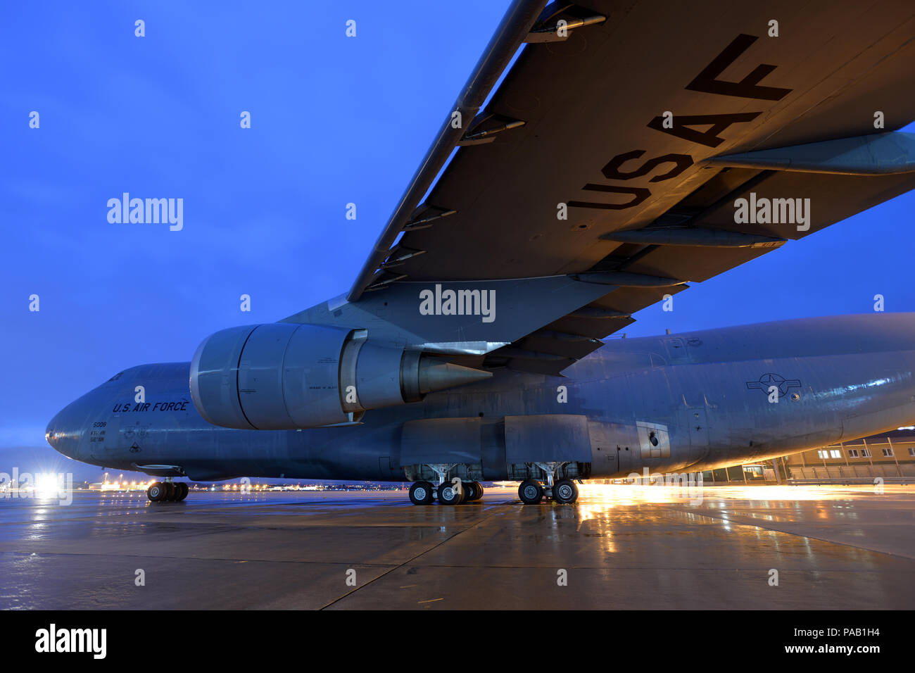 A U.S. Air Force Lockheed C5 Galaxy aircraft sits quietly at the