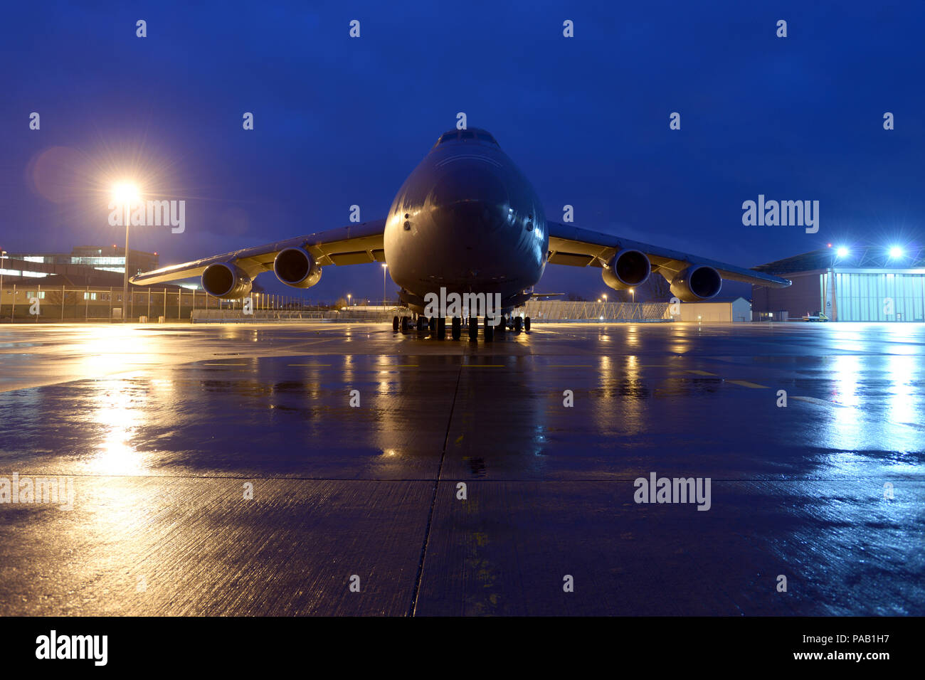 A U.S. Air Force Lockheed C5 Galaxy aircraft sits quietly at the