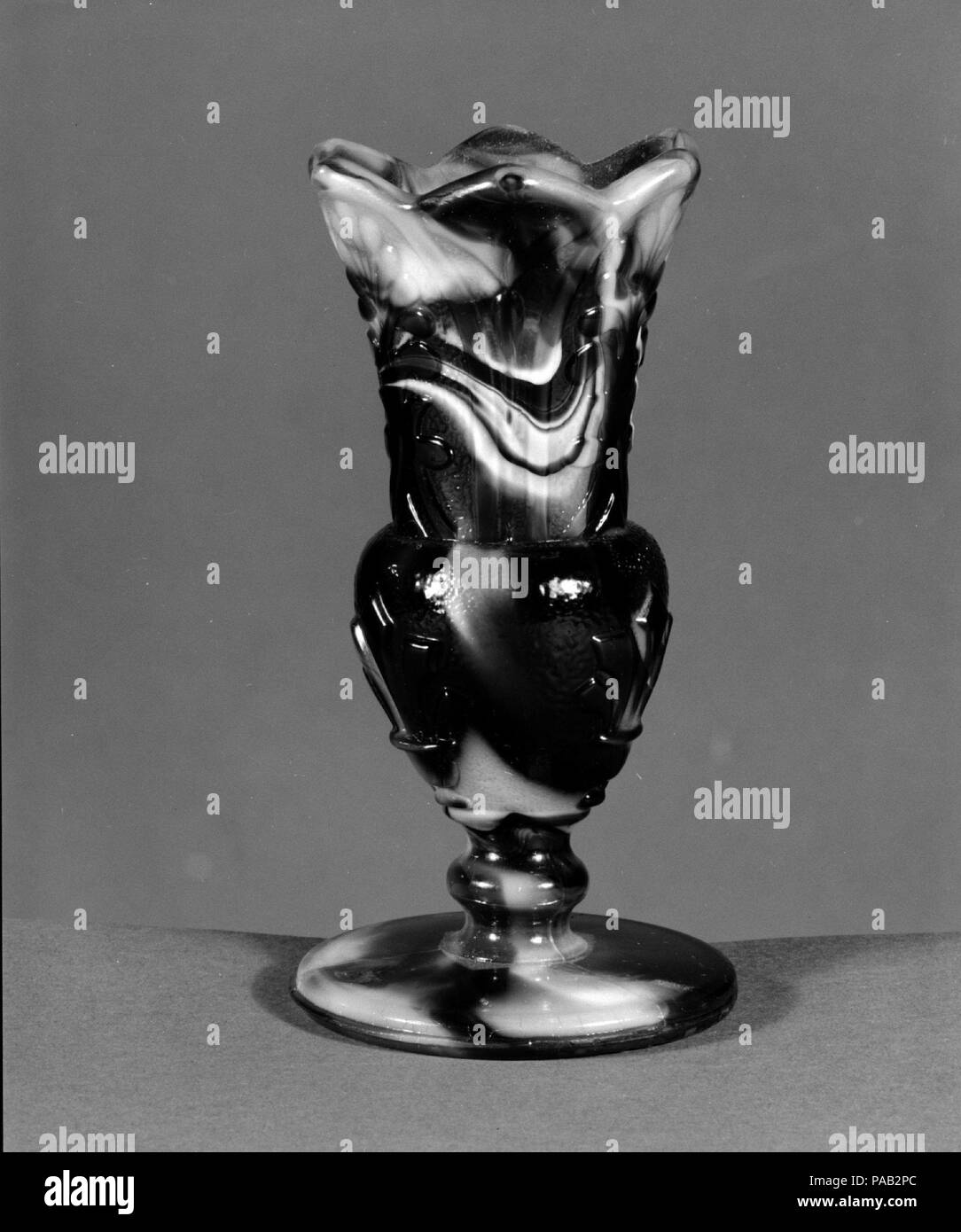 Vase. Dimensions: H. 4 1/2 in. (11.4 cm). Date: 1880-90. Museum: Metropolitan Museum of Art, New York, USA. Stock Photo