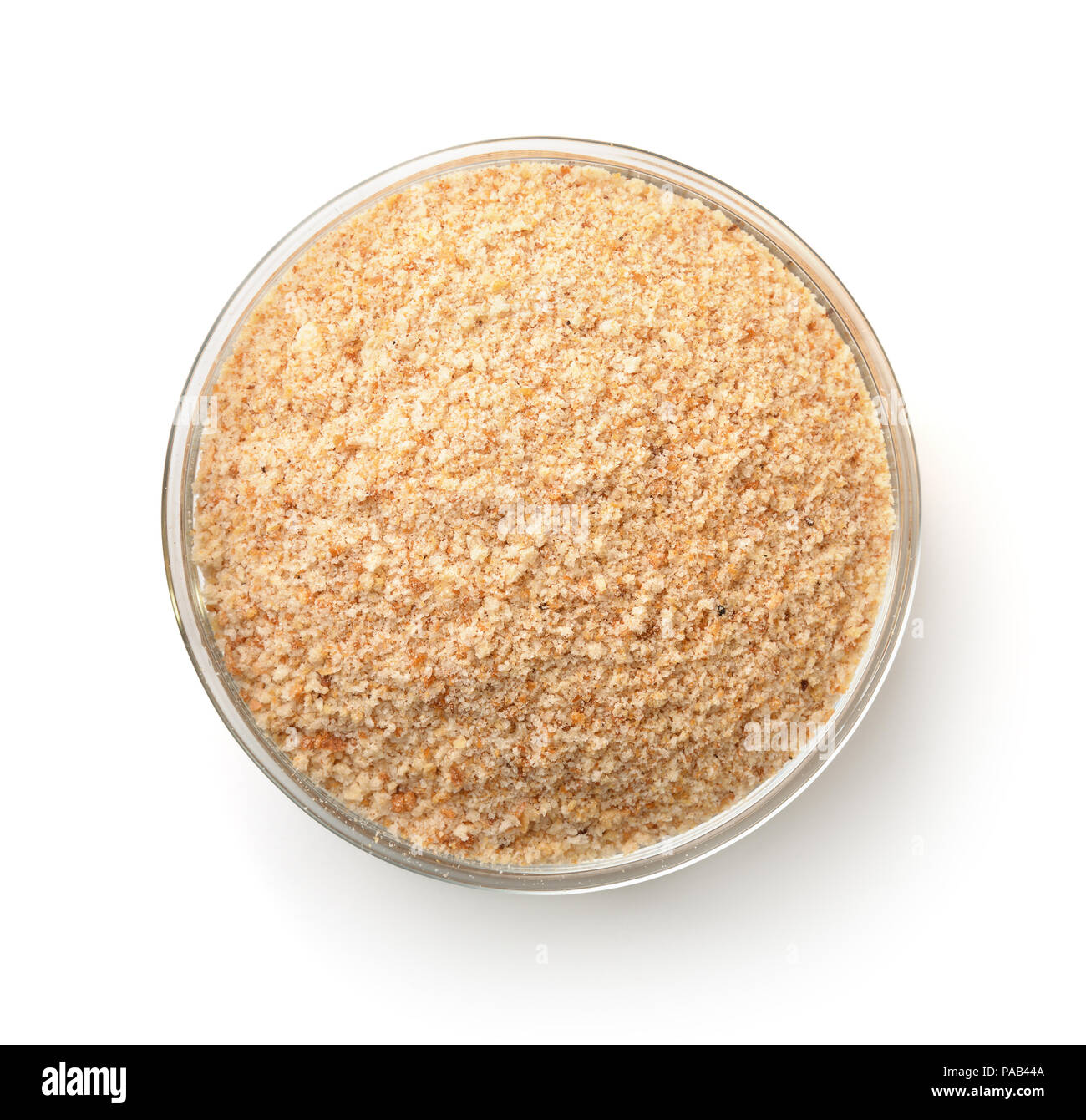 Top view of glass bowl with  breadcrumbs isolated on white Stock Photo