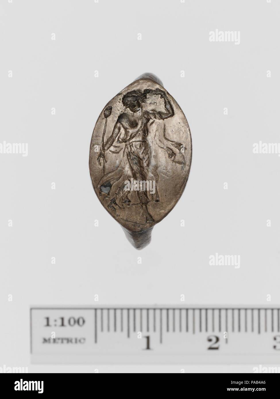 Silver ring. Culture: Greek. Dimensions: Length: 7/8 in. (2.2 cm). Date: ca. late 5th century B.C..  Ecstatic maenad. Museum: Metropolitan Museum of Art, New York, USA. Stock Photo
