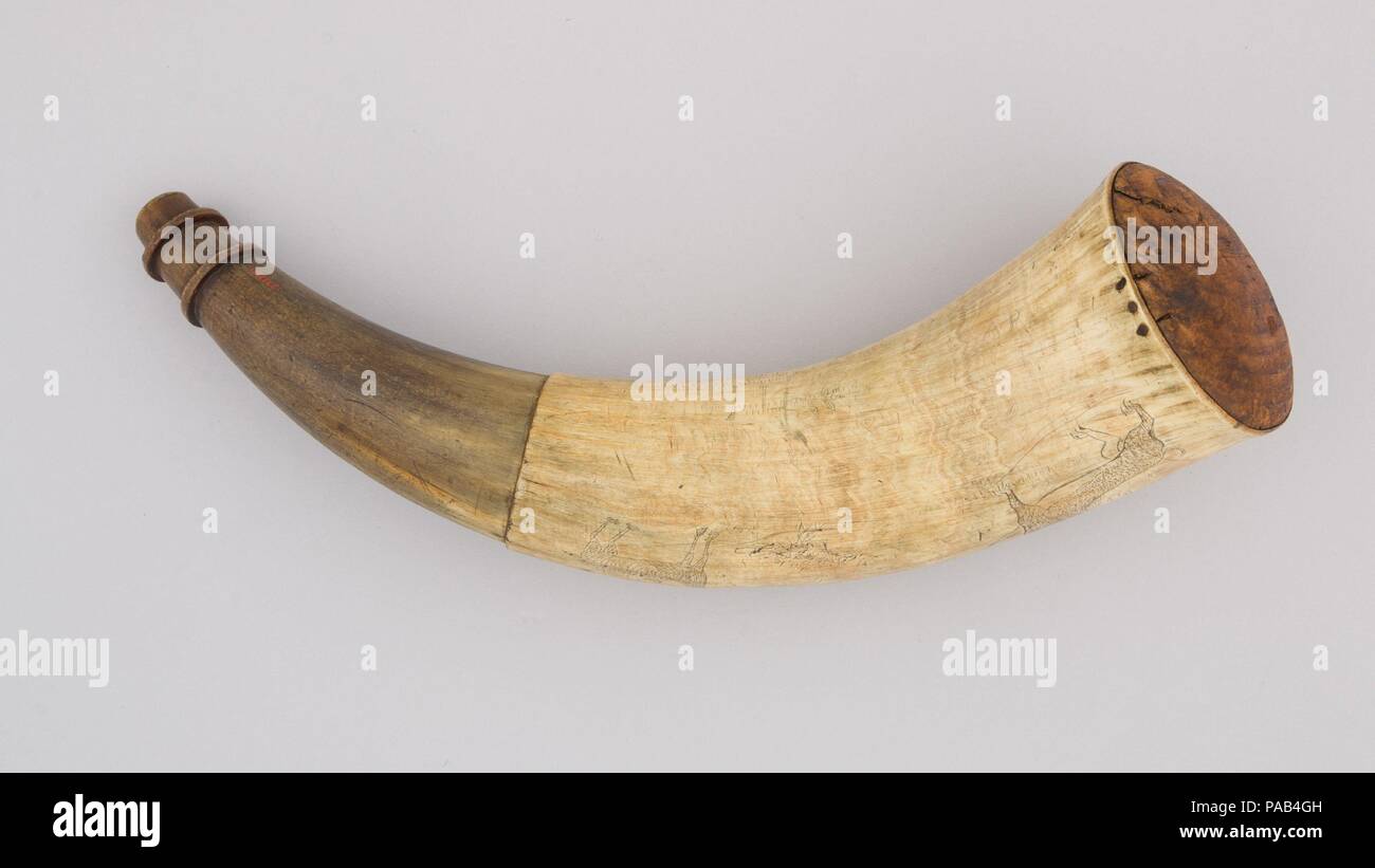 Powder Horn. Culture: Colonial American, Ticonderoga, New York. Dimensions: L. 13 5/8 in. (34.6 cm); Diam. 3 1/2 in. (8.9 cm); Wt. 10.1 oz. (286.3 g). Date: 1759.  This powder horn is decorated with a dragon, among other animals and birds. Museum: Metropolitan Museum of Art, New York, USA. Stock Photo