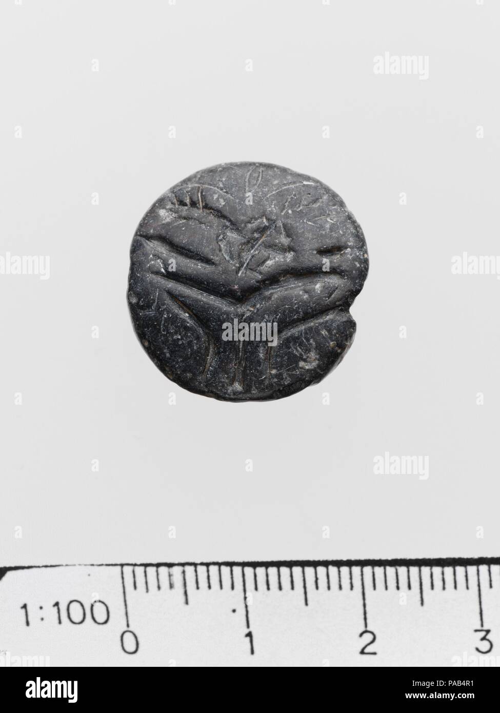 Steatite lentoid seal. Culture Mycenaean. Dimensions Diameter 1.91 cm