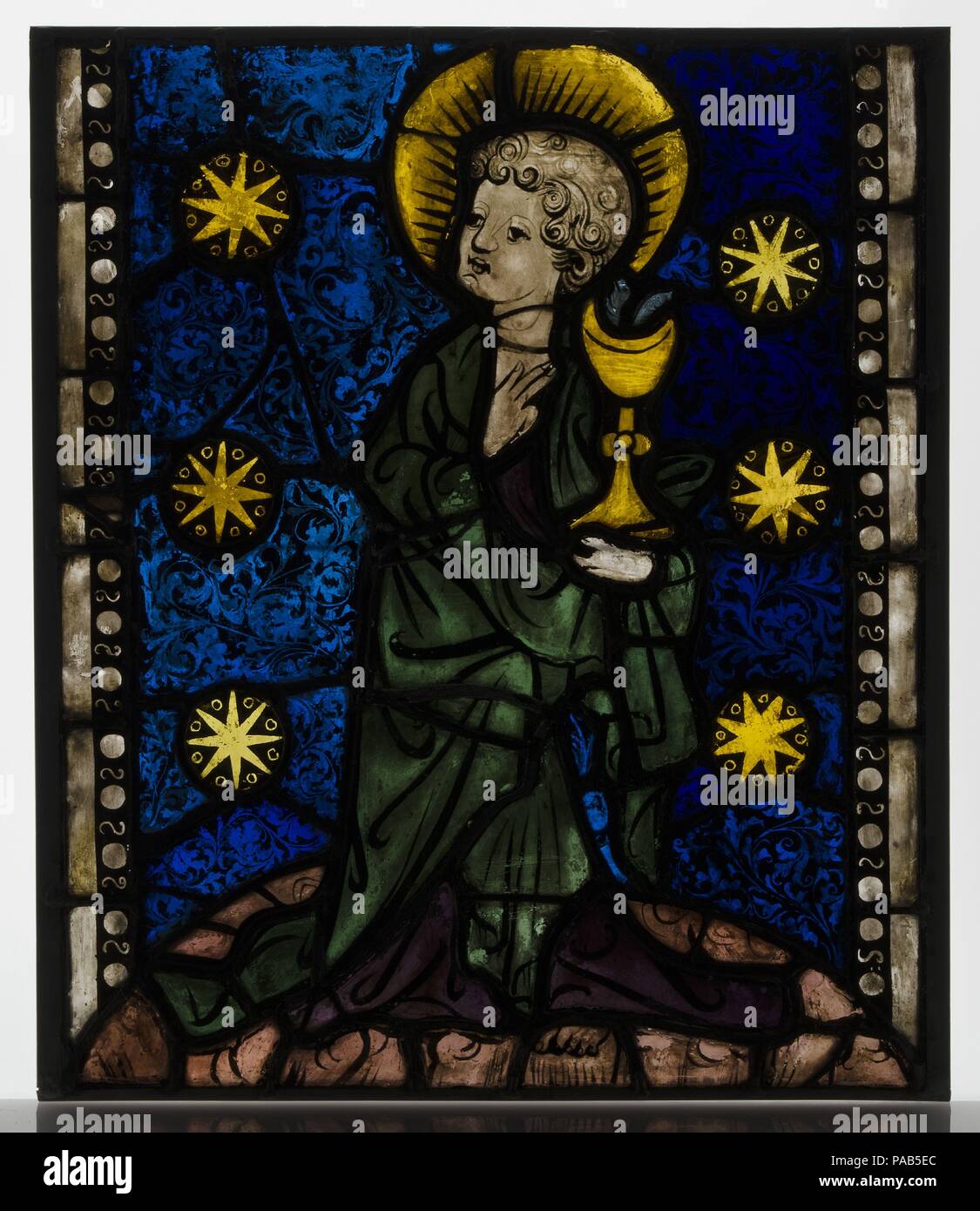 Saint John the Evangelist. Culture: Austrian. Dimensions: Overall: 20 x 17 in. (50.8 x 43.2 cm). Date: ca. 1410. Museum: Metropolitan Museum of Art, New York, USA. Stock Photo