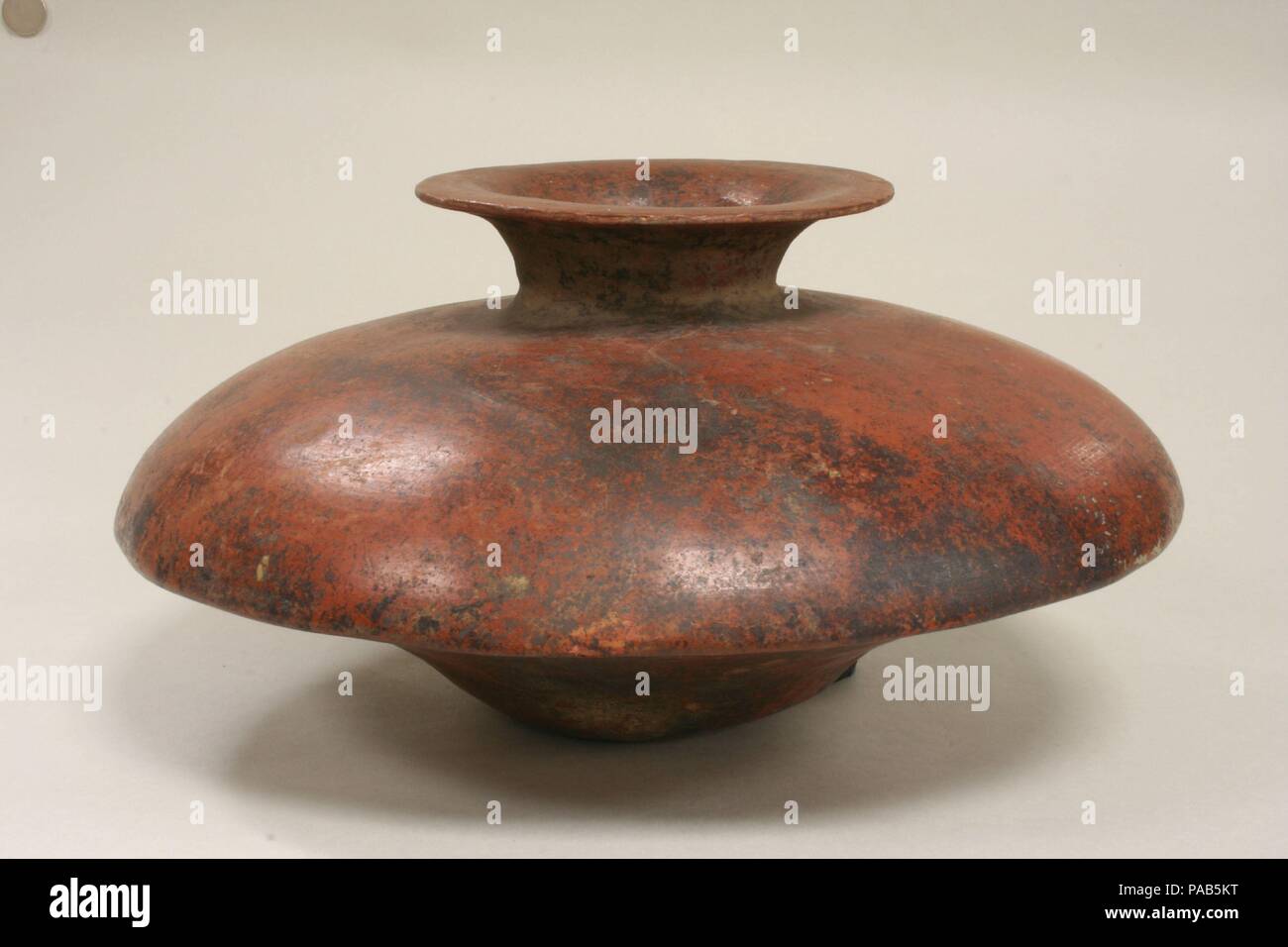 Jar. Culture: Colima. Dimensions: H. 6 7/16 x Diam. 13 3/8 in. (16.4 x 34 cm). Date: 2nd century B.C.-A.D. 3rd century. Museum: Metropolitan Museum of Art, New York, USA. Stock Photo