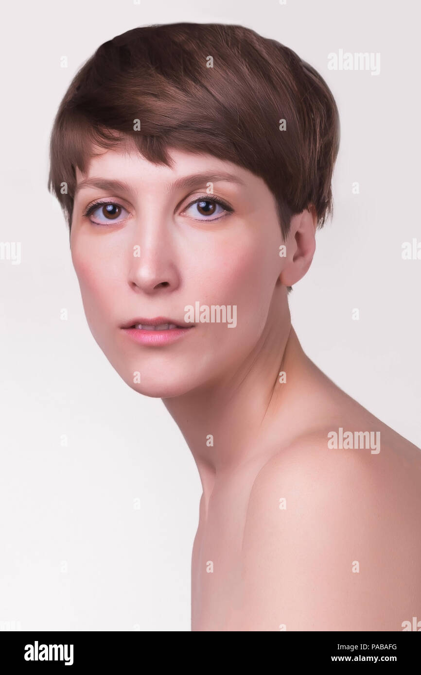 Beautiful female face close up. portrait of young model at studio on ...