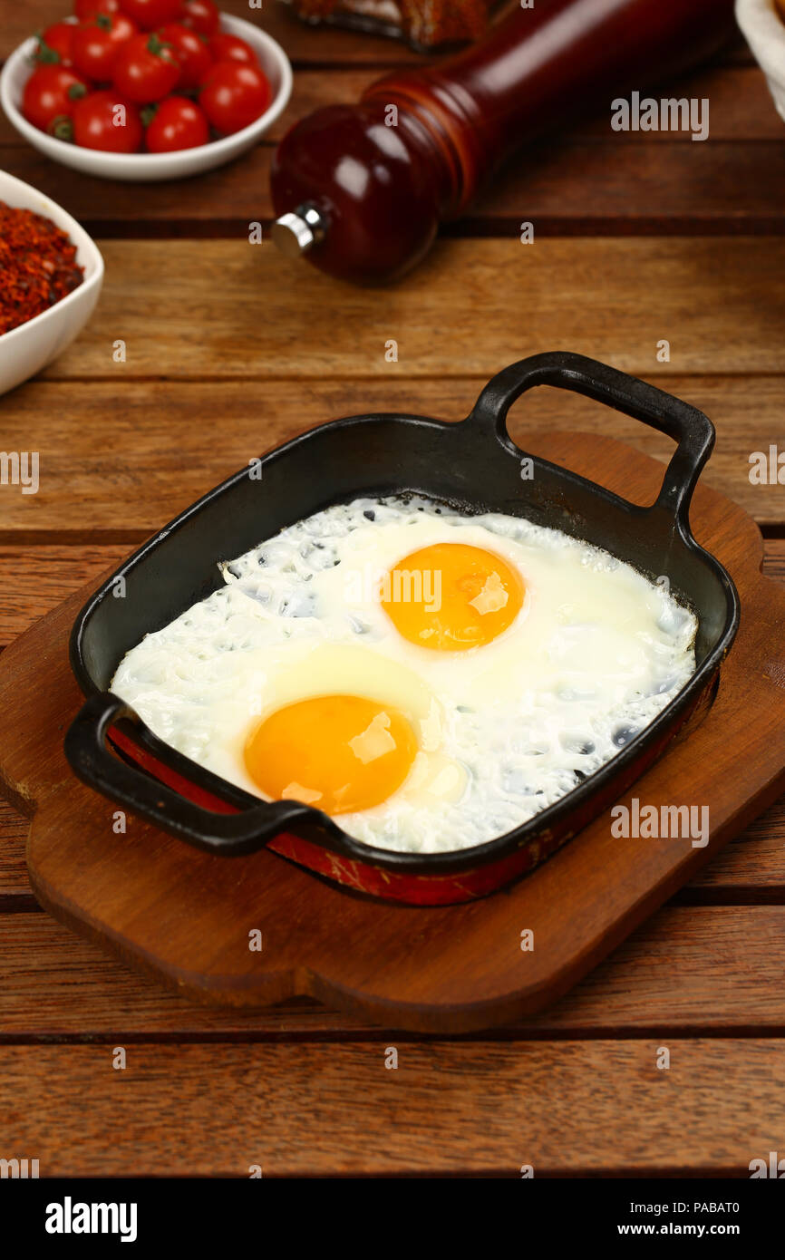 Fried Egg on frying a pan Stock Photo - Alamy