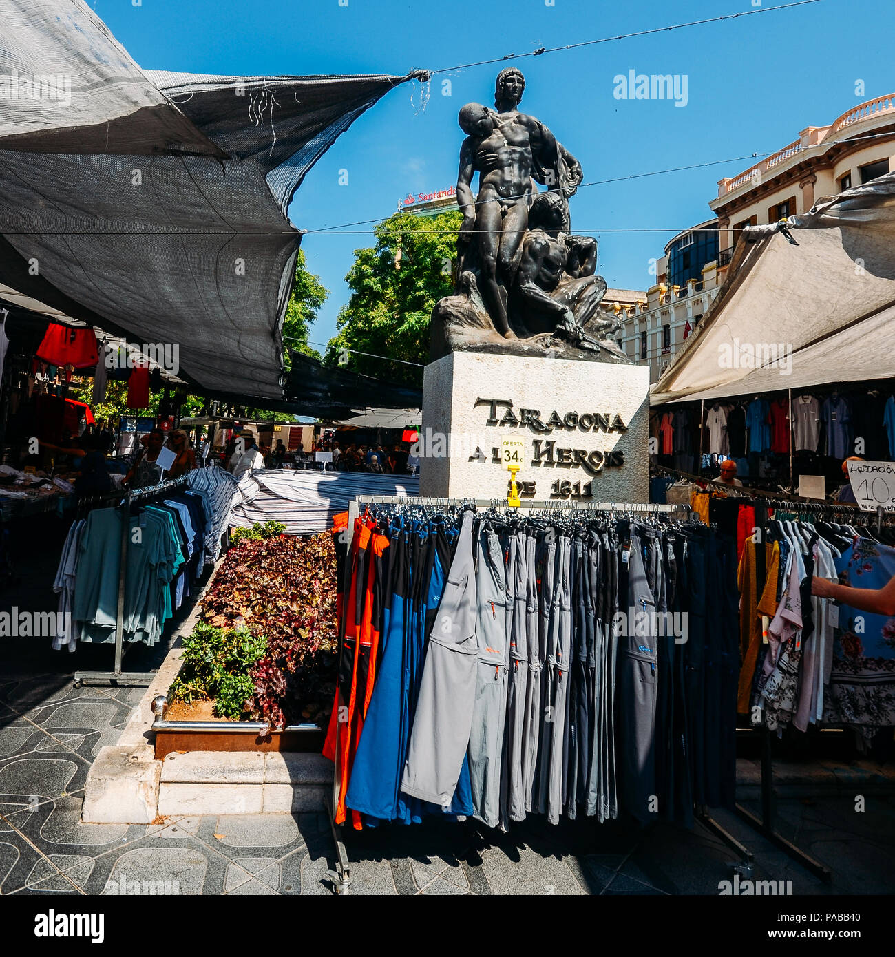 Tarragona, Spain July 12, 2018 Shoppers at street market outlet on