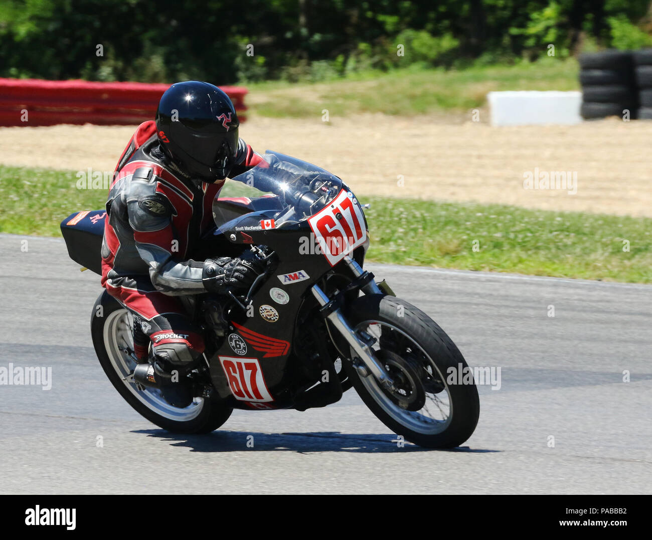 Motorcycle 617 with logos including Scott MacKenzie, AMA, Rocket