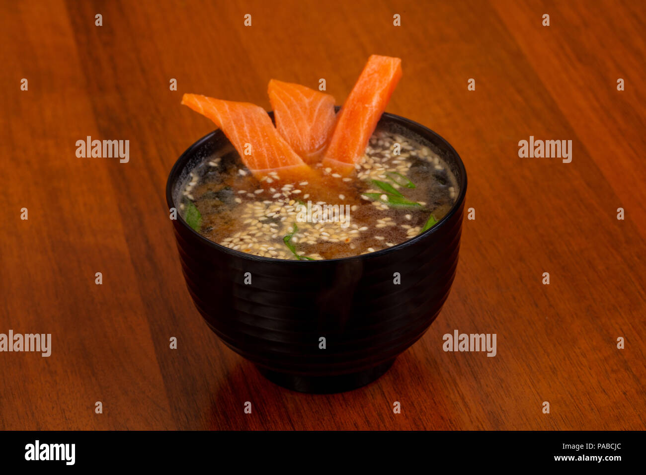 Japanese Miso soup with Salmon and sesam seeds Stock Photo