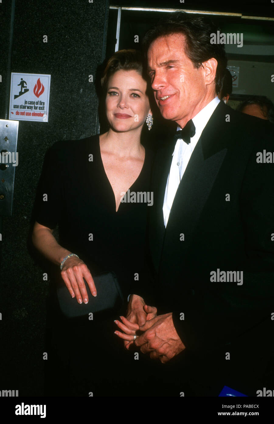 LOS ANGELES, CA - MARCH 30: Actress Annette Bening and actor Warren Beatty  attends the 64th Annual Academy Awards on March 30, 1992 at the Dorothy  Chandler Pavilion in Los Angeles, California., image size:901x1390