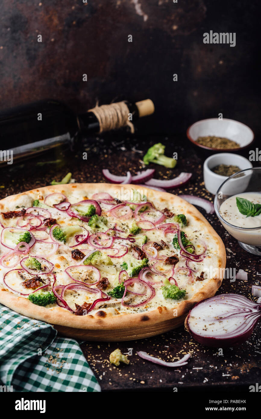 Broccoli pizza with sour cream sauce. Italian pizza Stock Photo Alamy