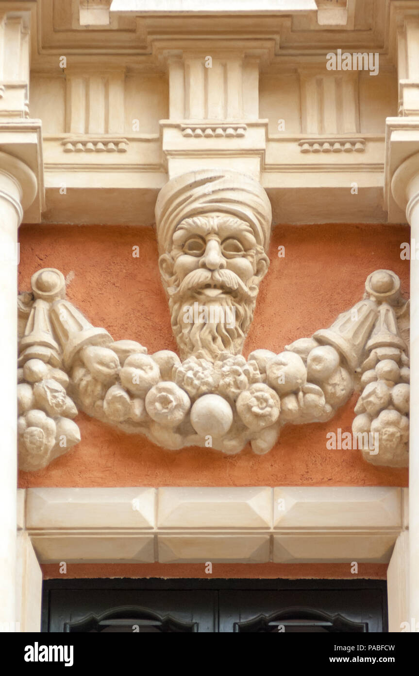 Ornate Decoration Above A Doorway In Rome Stock Photo 212924569