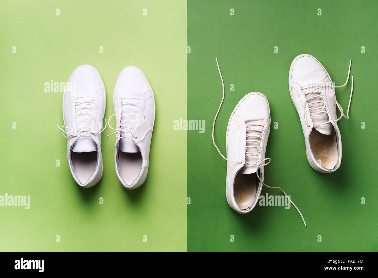 Old dirty sneakers vs new white sneakers on green background. Trendy ...