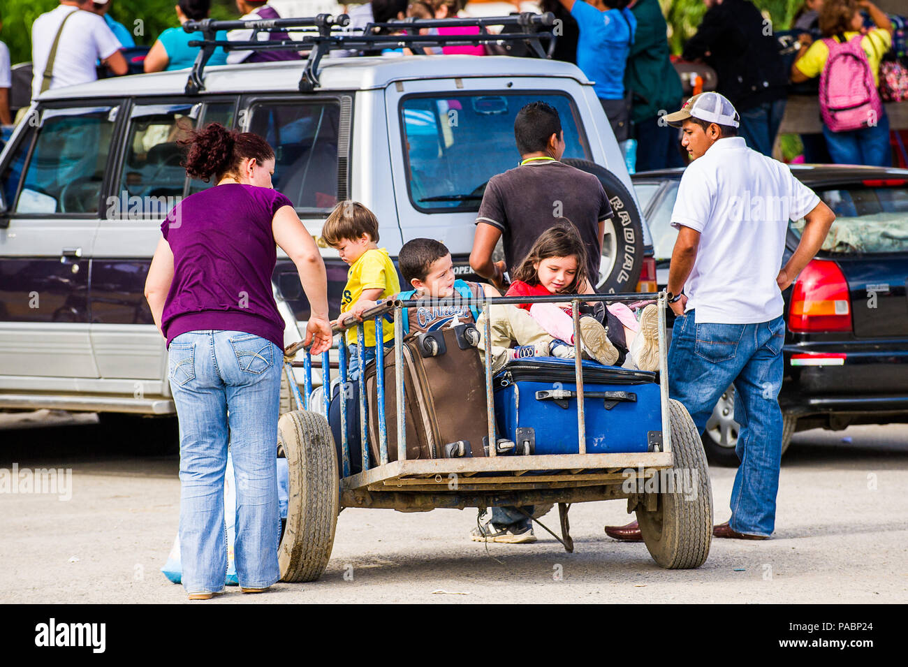 San Jose Costa Rica Jan 6 12 Unidentified Costa Rican Children In A Carriage With Luggage 65 8 Of Costa Rican People Belong To The White Cas Stock Photo Alamy
