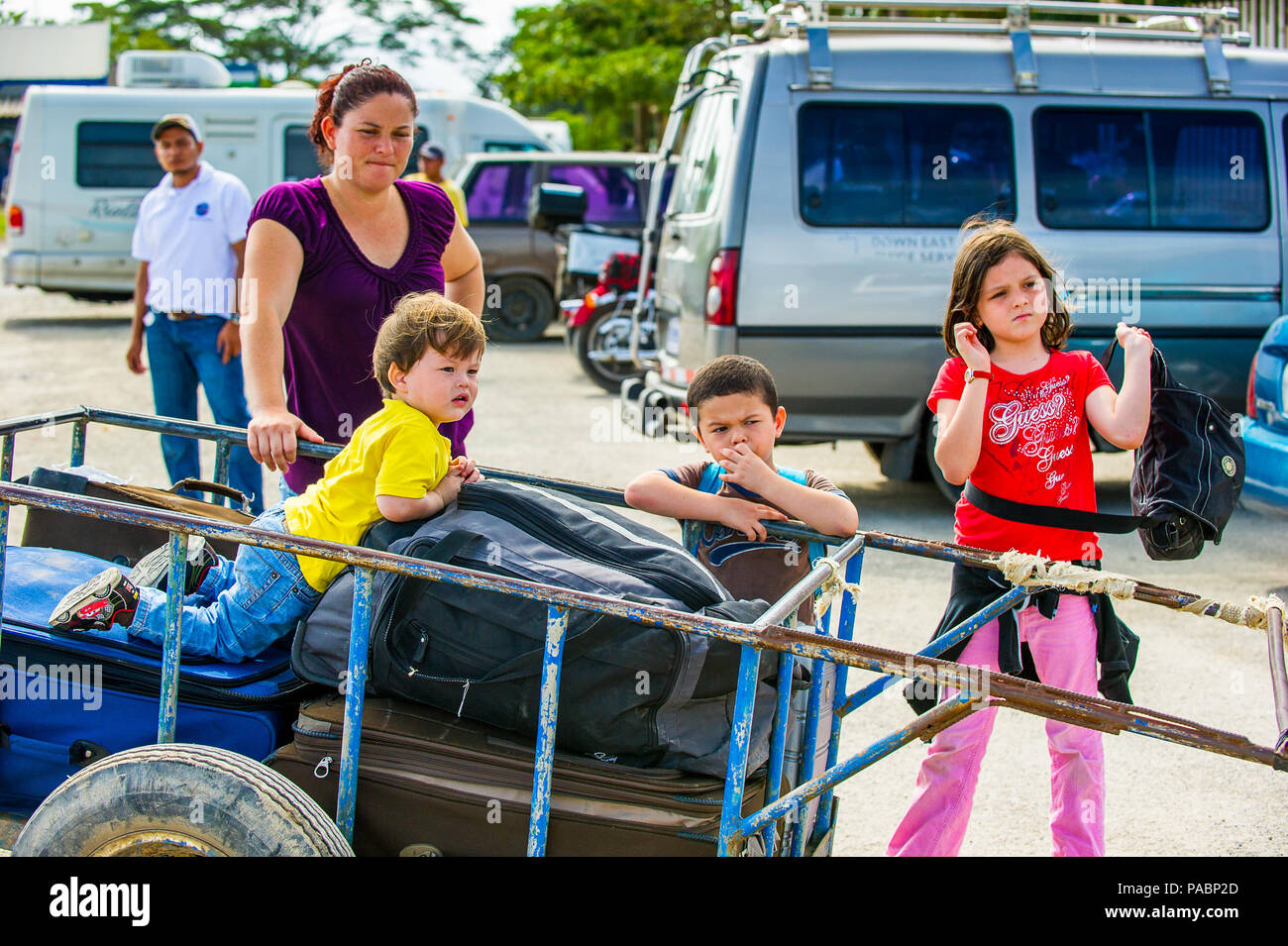 San Jose Costa Rica Jan 6 12 Unidentified Costa Rican Children In A Carriage With Luggage 65 8 Of Costa Rican People Belong To The White Cas Stock Photo Alamy