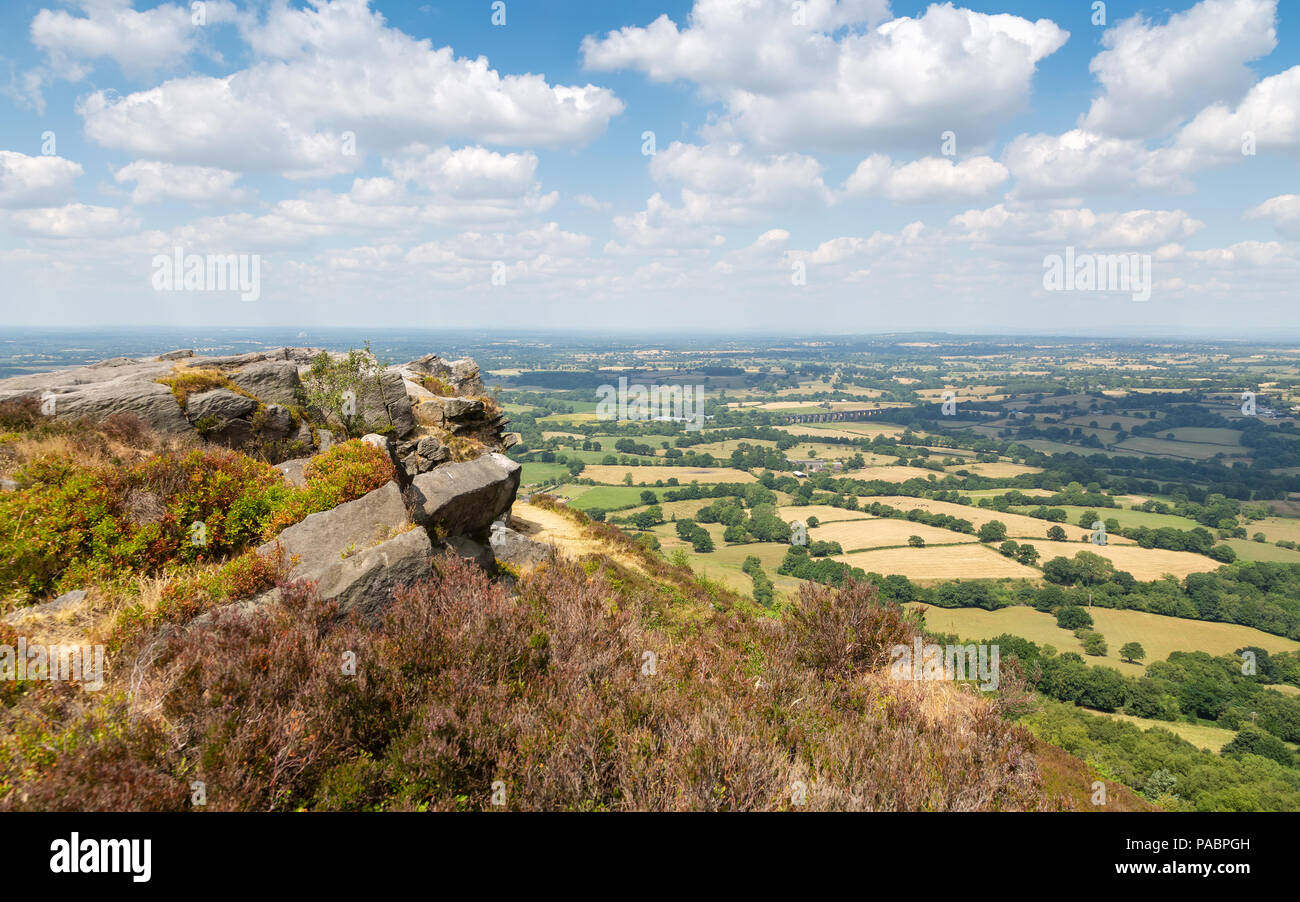 Rocky outcrop at Bosley cloud in cheshire with view over the plains Stock Photo