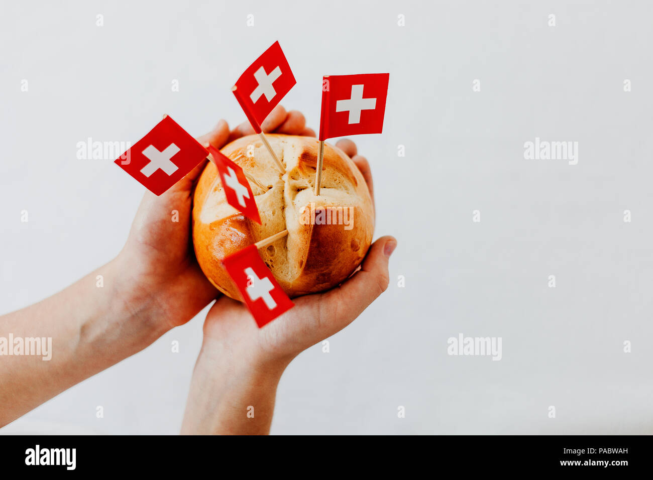 Traditional swiss bread buns called in German 1.Augustweggen baked in  Switzerland to celebrate Swiss National Day on August 1st. Body parts,  children Stock Photo - Alamy