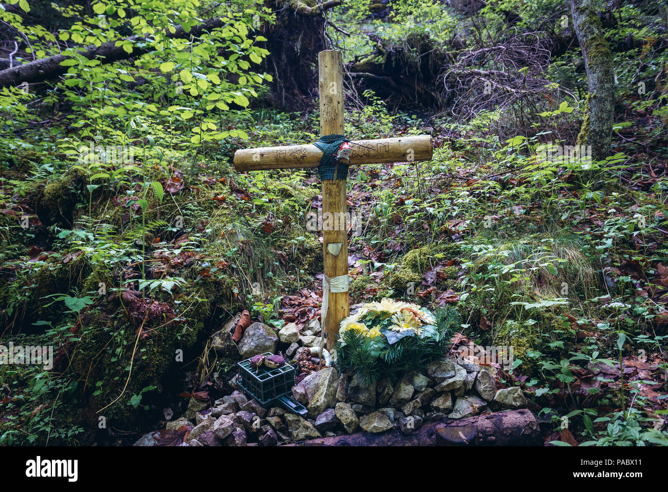 Wooden cross marking site of rescue helicopter crash in July, 2015 next to Hiking trail called Prielom Hornadu in Slovak Paradise National Park Stock Photo