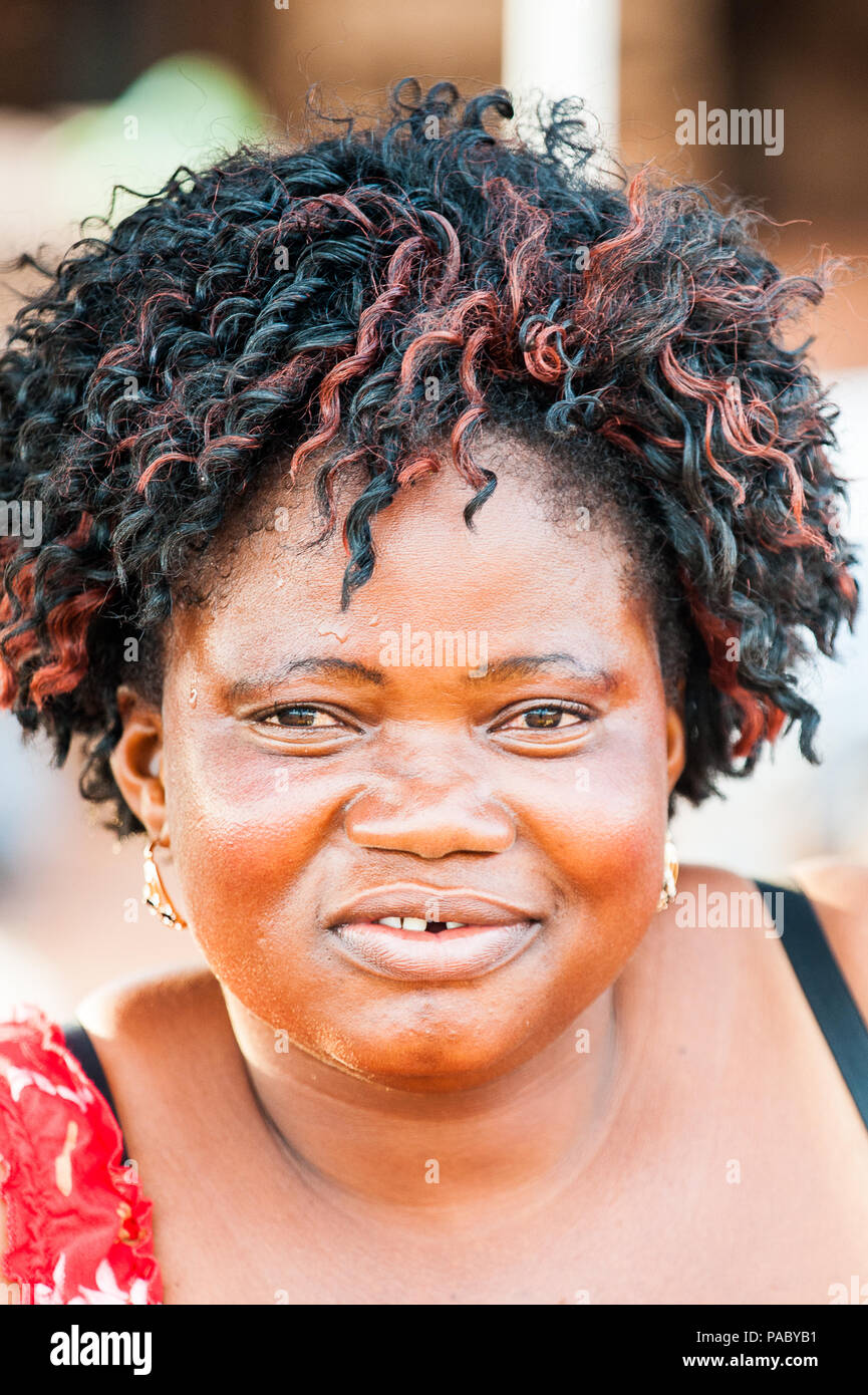 ACCRA, GHANA - MARCH 4, 2012: Unidentified Ghanaian woman with black ...