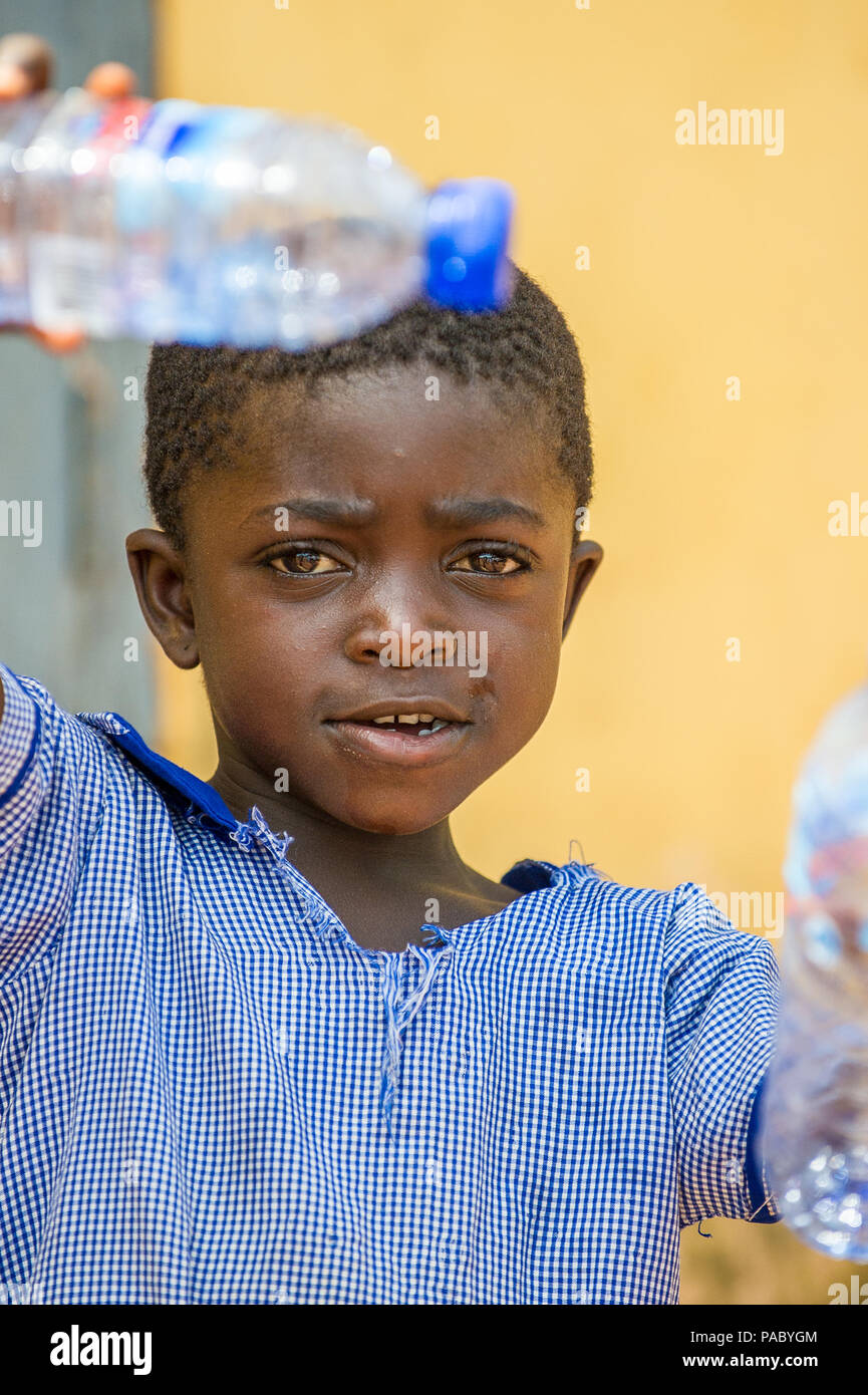 ACCRA, GHANA MARCH 6, 2012 Unidentified Ghanaian boy with an empty