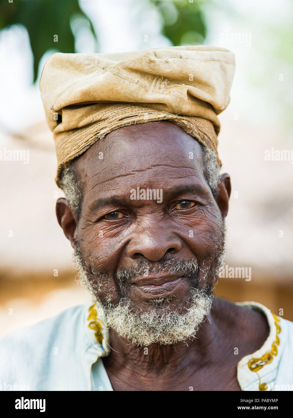 ACCRA, GHANA - MARCH 6, 2012: Unidentified Ghanaian old man with a hat ...