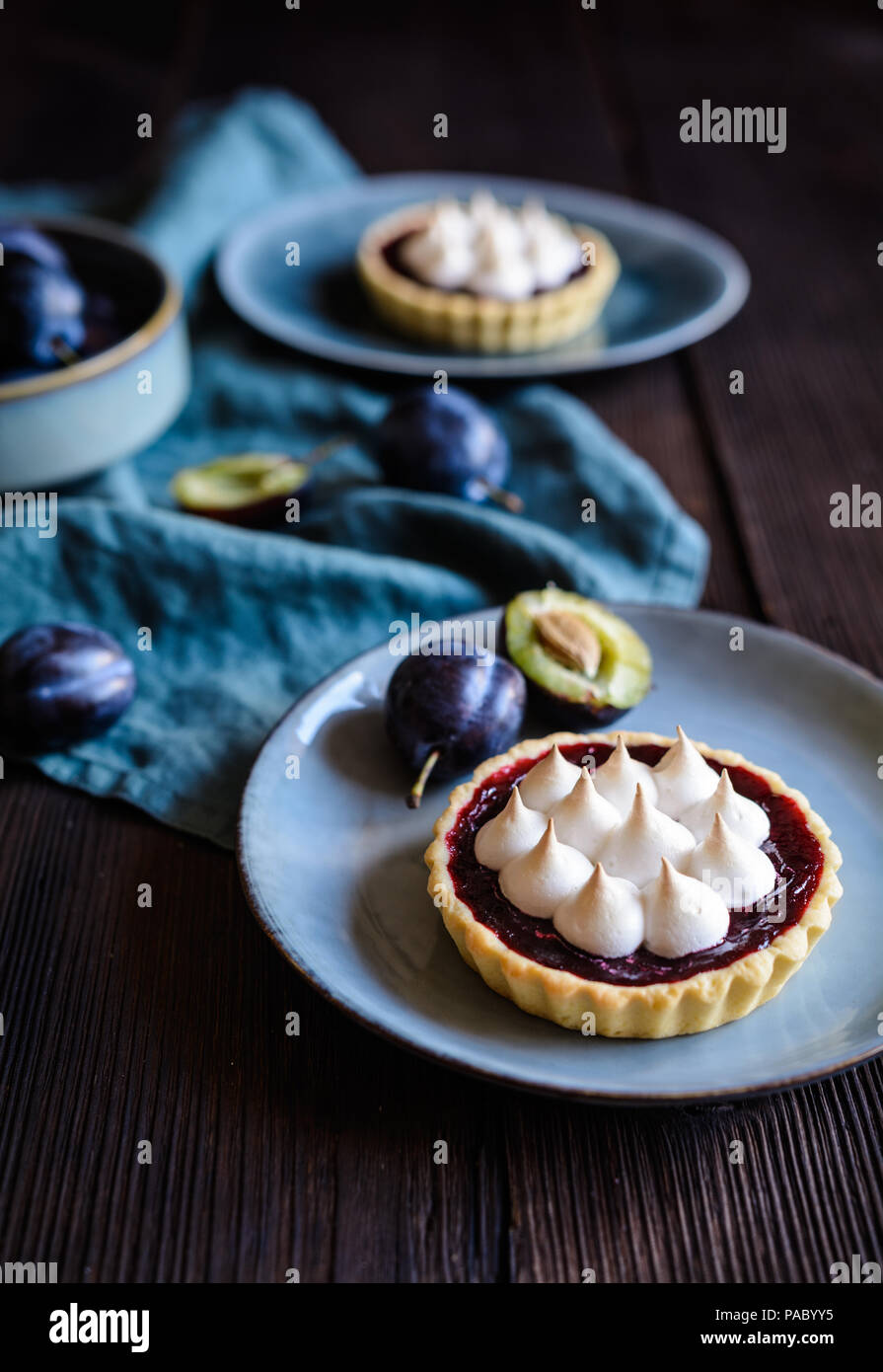 Delicious plum tartlets with meringue on top Stock Photo