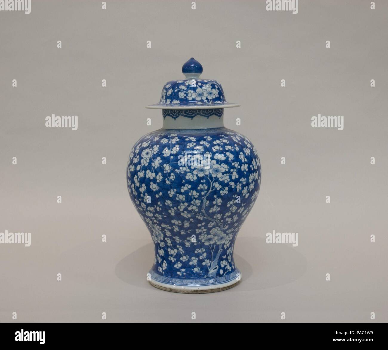 Covered Jar. Culture: China. Dimensions: H. 17 1/2 in. (44.5 cm); W. 9 in. (44.5 x 22.9 cm); Diam. of rim: 4 5/8 in. (11.7 cm); Diam. of foot: 7 in. (17.8 cm). Museum: Metropolitan Museum of Art, New York, USA. Stock Photo