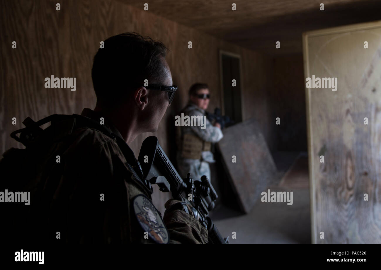 U.S. Air Force Staff Sgt. John McRell, and Staff Sgt. Kathryn Lozier ...