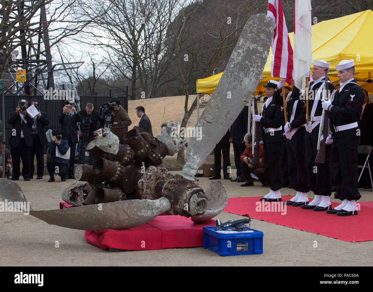 160306-N-QY759-052 SAIKI CITY, Japan (March 6, 2016) The Commander U.S. Fleet Activities Sasebo Color Guard renders honors at the departure ceremony for parts of a World War II F4U-1D Corsair fighter-bomber held at Yawaragi Peace Memorial Hall in Saiki City, Japan. The parts are from a Fighter Squadron (VF) 10 Corsair that was ditched off Saiki on March 18, 1945 after attacking an Oita military airfield. They were salvaged from the water and displayed until the decision was made to return them to the U.S. Navy as a goodwill gesture marking seven decades since the end of World War II. (U.S. Nav Stock Photo