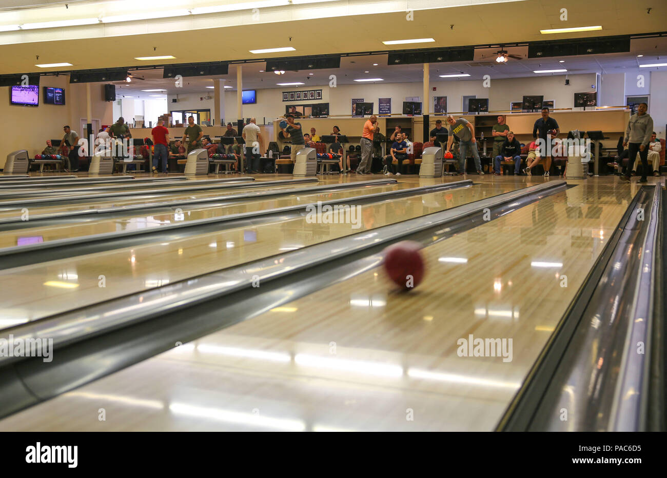 Participants in the Commanding General’s Cup Scratch Bowling Tournament compete against each other at the recreation center on Marine Corps Recruit Depot San Diego, March 8. Each participant played three games, and their scores were added up to see who achieved the highest scores at the end of the tournament. Stock Photo