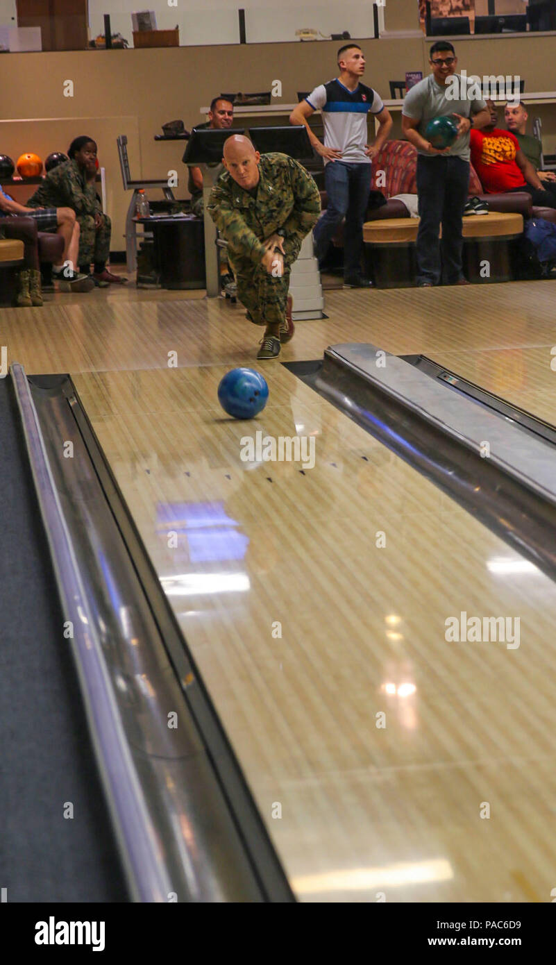 A participant in the Commanding General’s Cup Scratch Bowling Tournament bowls at the recreation center on Marine Corps Recruit Depot San Diego, March 8. The CG’s Cup holds several sports tournaments throughout the year including volleyball and basketball. The bowling tournament was open to any active duty military members and permanent personnel who work aboard the depot. Stock Photo