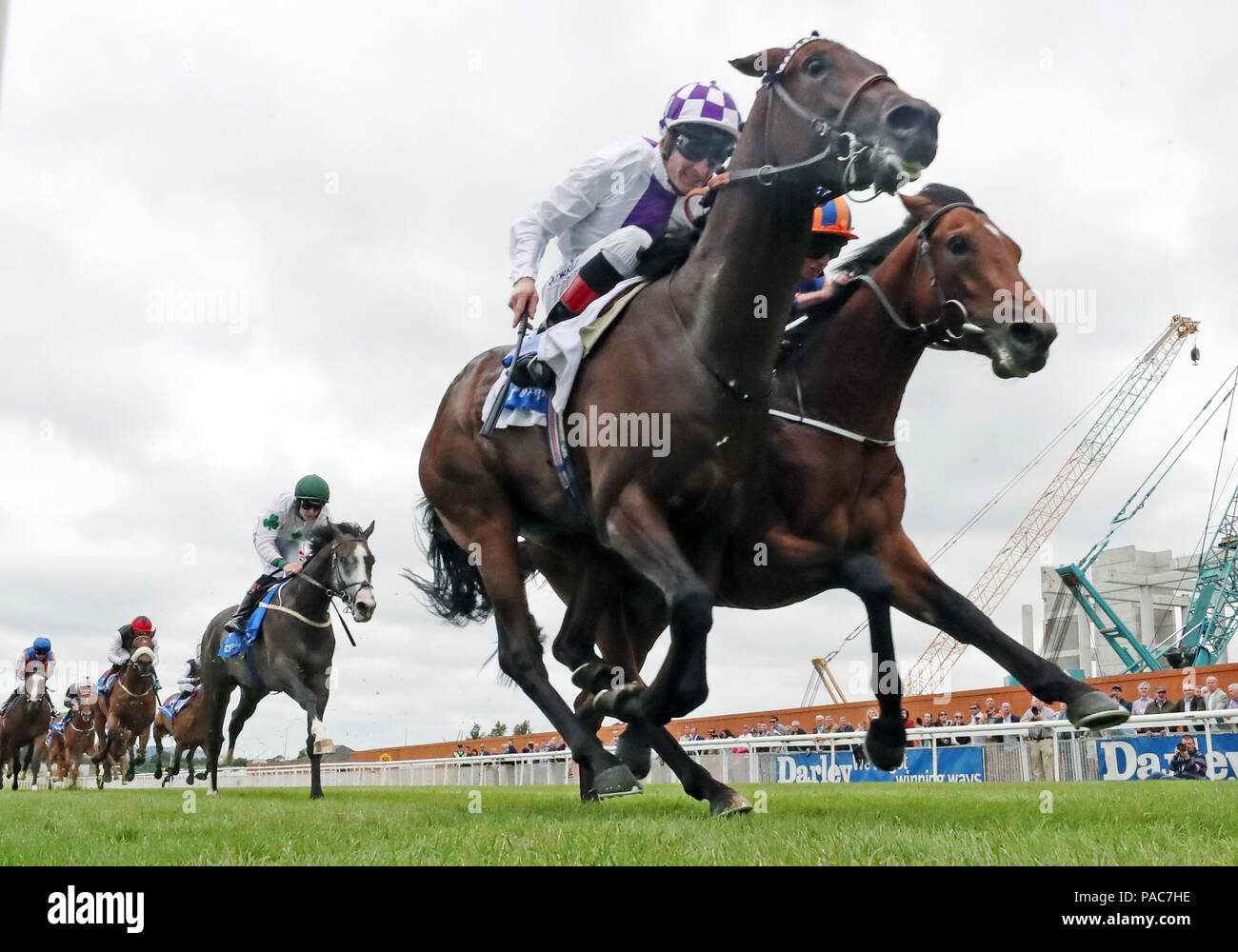 Guaranteed ridden by Kevin Mannong wins the The Club Godolphin Irish EBF Maiden during day one of the Darley Irish Oaks Weekend at Curragh Racecourse, County Kildare. Stock Photo