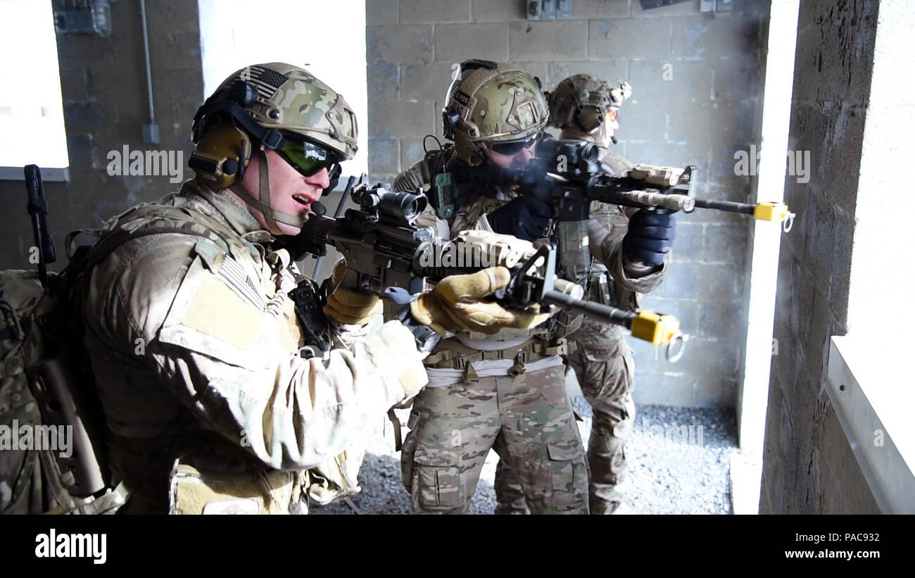 Airmen from the New York Air National Guard’s 274th Air Support Operations Squadron (ASOS) participate in Close Air Support (CAS) training that enhances their ability to identify a target and neutralize a threat at Fort Drum, N.Y.'s urban training site on Saturday, March 5, 2016. The 274th mission is to advise U.S. Army commanders on how to best utilize U.S. and NATO assets for Close Air Support. ( U.S. Air National Guard photo by Master Sgt. Eric Miller) Stock Photo