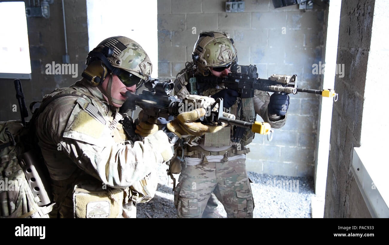 Airmen from the New York Air National Guard’s 274th Air Support Operations Squadron (ASOS) participate in Close Air Support (CAS) training that enhances their ability to identify a target and neutralize a threat at Fort Drum, N.Y.'s urban training site on Saturday, March 5, 2016. The 274th mission is to advise U.S. Army commanders on how to best utilize U.S. and NATO assets for Close Air Support. (U.S. Air National Guard photo by Master Sgt. Eric Miller) Stock Photo